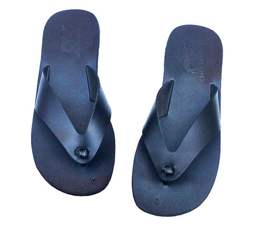 Pair of blue flip-flops on a white background