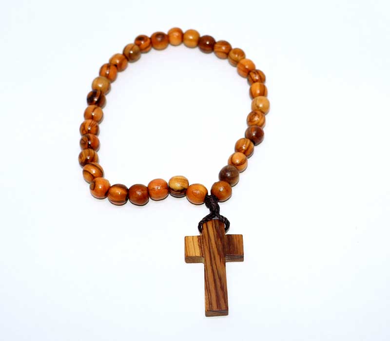 Wooden beaded bracelet with a cross pendant